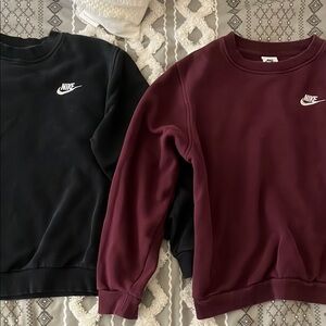 Nike Black and burgundy sweaters.